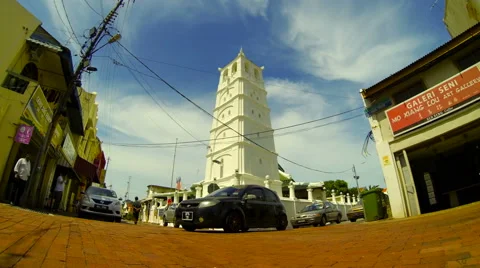 Time lapse of Kampung Kling Mosque and traffic in Melaka old town. 4K Stock Footage 40243640