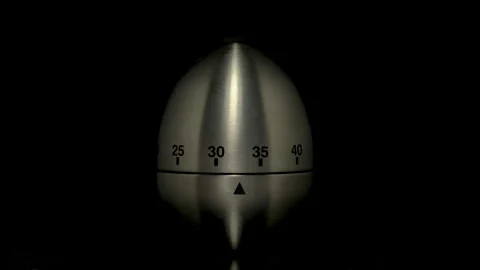 Time lapse of a kitchen clock timer countdown. Stock Footage 303397808