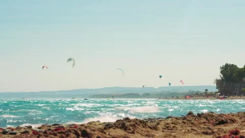 Time lapse of kite surfers on the Mediterranean sea Stock Footage 282783594