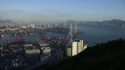 Time-lapse of Kowloon and Hong Kong Island from Chun Fa Lok at nightfall Stock Footage