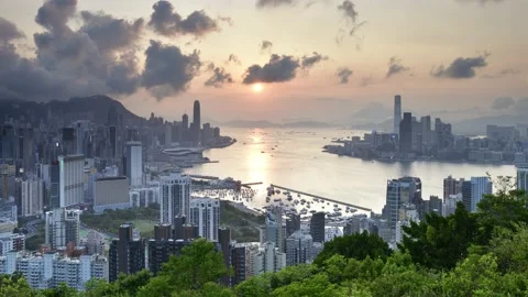 Time-lapse of Kowloon and Hong Kong Island from Hung Heung Lo Fung under sunset Stock Footage 233494932