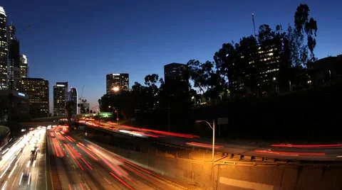 Time Lapse of LA Downtown &amp; Freeway Los Angeles at night Stock Footage 55808727