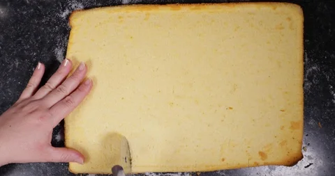 Time Lapse Of Lady Cutting Plain Cake Into Strips To Prepare To Spread Egg 스톡 동영상 109200506