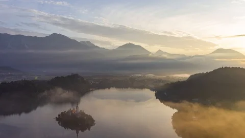 Time lapse of Lake Bled, island and castle at sunrise Stock Footage 118407190