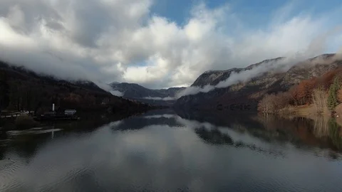 Time lapse of lake Bohinj with reflection of clouds in water Stock Footage 120676884