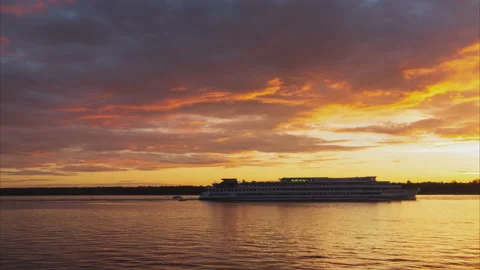 Time lapse of lake or river with moving silhouettes boats and cruise liner Stock Footage 168284309