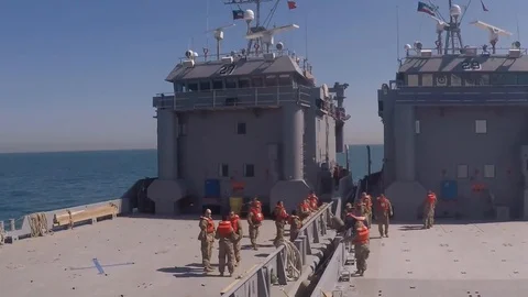 Time lapse of landing crafts separating in the ocean Stock Footage 112127994