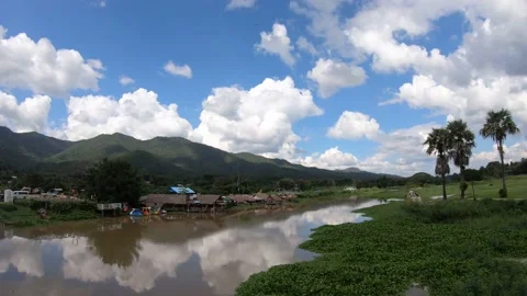 Time lapse landscape moving clouds and rivers Stock Footage 142682730