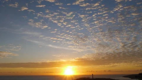 Time-lapse landscape , red purple blue yellow pink clouds are moving fast in the 動画素材 131130745