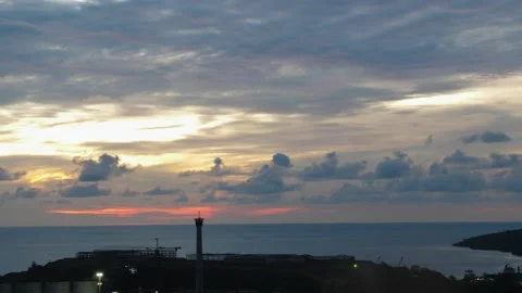 Time-lapse landscape , red purple blue yellow pink clouds are moving fast in the Stock Footage 131130778