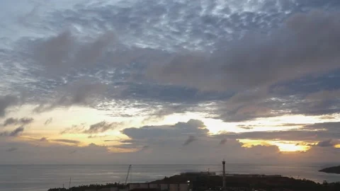 Time-lapse landscape , red purple blue yellow pink clouds are moving fast in the Stockbeeldmateriaal 131130809