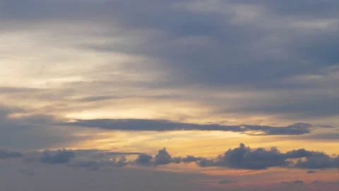Time-lapse landscape , red purple blue yellow pink clouds are moving fast in the Stockbeeldmateriaal 131130894