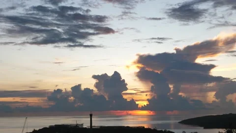 Time-lapse landscape , red purple blue yellow pink clouds are moving fast in the Stock Footage 131131037