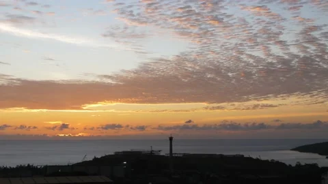 Time-lapse landscape , red purple blue yellow pink clouds are moving fast in the Stock Footage 131131189