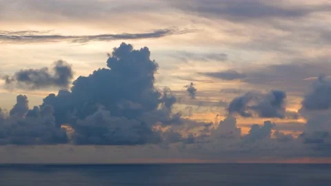 Time-lapse landscape , red purple blue yellow pink clouds are moving fast in the Stockbeeldmateriaal 131131392
