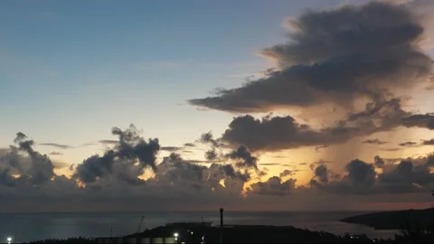Time-lapse landscape , red purple blue yellow pink clouds are moving fast in the Stockbeeldmateriaal 131131633