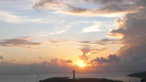 Time-lapse landscape , red purple blue yellow pink clouds are moving fast in the Stock Footage 131131652