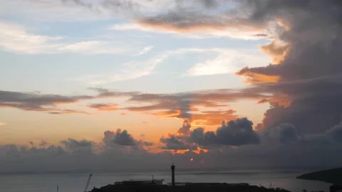Time-lapse landscape , red purple blue yellow pink clouds are moving fast in the Stockbeeldmateriaal 131131685