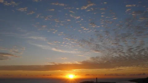 Time-lapse landscape , red purple blue yellow pink clouds are moving fast in the 動画素材 131132055