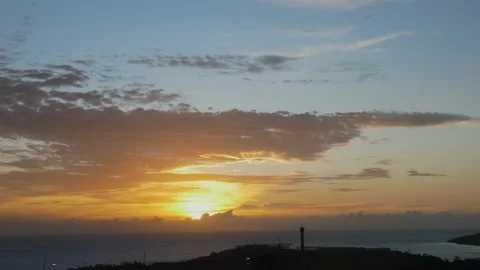 Time-lapse landscape , red purple blue yellow pink clouds are moving fast in the Stockbeeldmateriaal 131132205