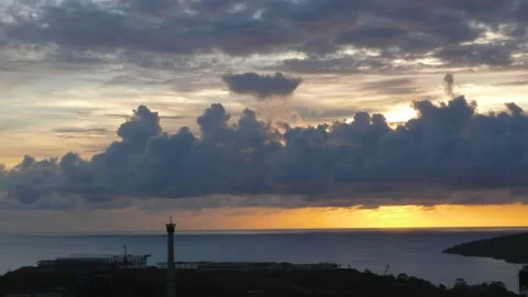 Time-lapse landscape , red purple blue yellow pink clouds are moving fast in the Stock Footage 131132236