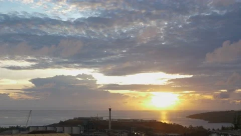 Time-lapse landscape , red purple blue yellow pink clouds are moving fast in the Stock Footage 131132480