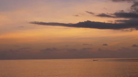 Time-lapse landscape , red purple blue yellow pink clouds are moving fast in the 動画素材 131133052