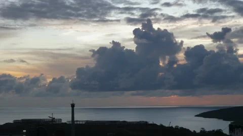 Time-lapse landscape , red purple blue yellow pink clouds are moving fast in the Stock Footage 131133209