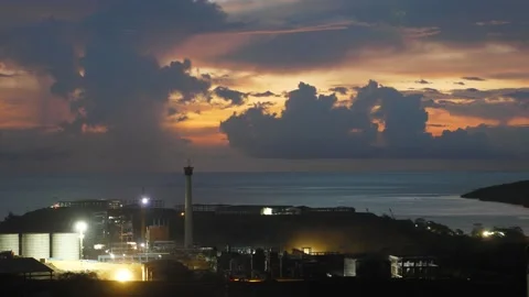 Time-lapse landscape , red purple blue yellow pink clouds are moving fast in the Stock Footage 131133302