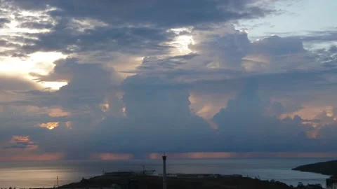 Time-lapse landscape , red purple blue yellow pink clouds are moving fast in the Stockbeeldmateriaal 131133430