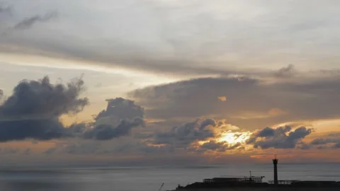Time-lapse landscape , red purple blue yellow pink clouds are moving fast in the Stock Footage 131133495