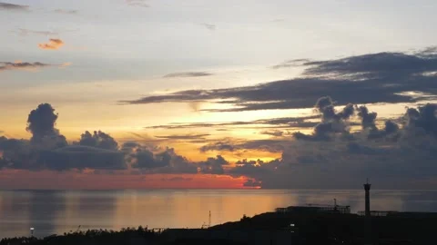 Time-lapse landscape , red purple blue yellow pink clouds are moving fast in the Stockbeeldmateriaal 131133791