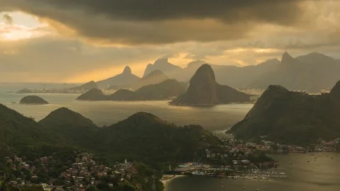Time lapse of landscape with sea, mountains and golden sunset of Rio de Janeiro Stock Footage