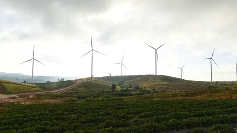 Time-Lapse of Landscape Sun sets in the fields of wind turbines. Stock Footage 76337524