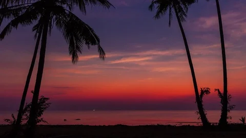 Time lapse landscape: sunset on a tropical beach with moving clouds in the sky Stock Footage 73535101