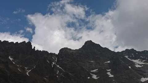 Time lapse Landscape view of dark mountain range Tatry party covered with snow Stock Footage 121551810