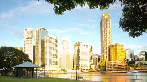 Time-lapse of a large city skyline at sunrise, glowing gold PAL 101GYBSD Stock Footage 26318190