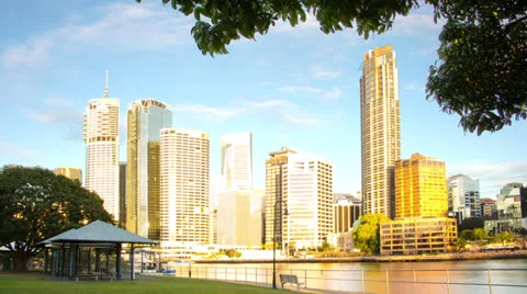 Time-lapse of a large city skyline at sunrise, glowing gold NTSC 101GYBSD Video stock 26318706