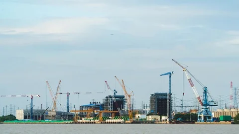 Time Lapse Large construction By the river with crane work. Stock Footage 116035868
