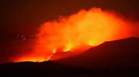 Time Lapse of Large Forest Fire at Night Stock Footage 25774793