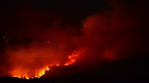 Time Lapse of Large Forest Fire at Night - 4K Stock Footage 25784982