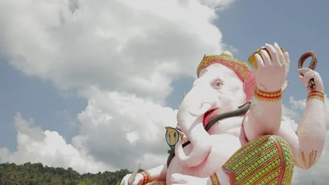 Time Lapse of The large Ganesh statue in sunrise light and clouds. Beliefs. Stock Footage 232647888
