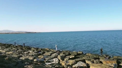 Time lapse of large group of people fishing in the coast Video stock 69881936
