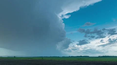 Time lapse of a large storm clouds over a prairie setting. Stock Footage 132807501