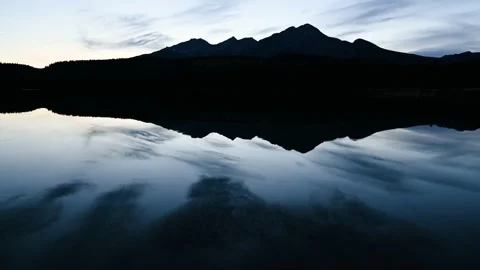 Time lapse of a late evening mountain setting with sharp mountain peaks Stock Footage 140508585
