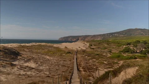 Time lapse leading of persons at steps at Guincho beach near Lisbon, Portugal. Stock Footage 96103985