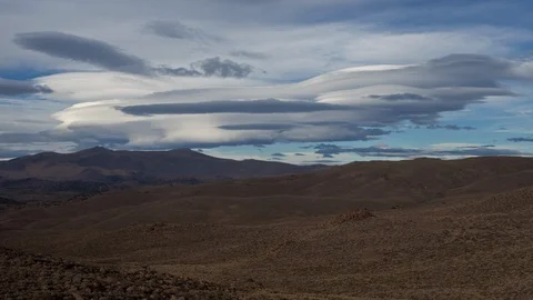 Time Lapse Of Lenticular Saucer Clouds Hovering Over Desert Mountains Stock Footage 117297865