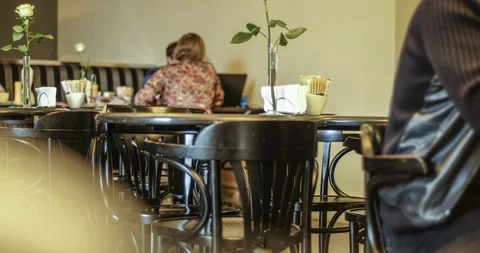 Time-lapse of life and movement in a dark expensive, chic cafe, bar Video stock 129598995