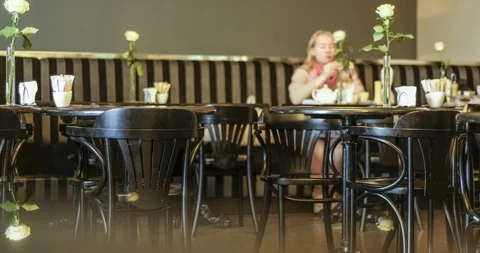 Time-lapse of life and movement in a dark expensive, chic cafe, bar Video stock 129599007