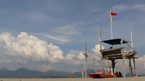Time lapse lifeguard tower with clouds Stock Footage 139071425